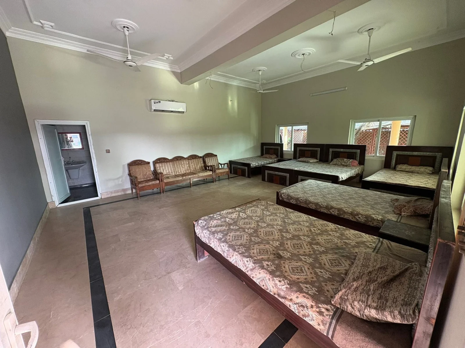 Spacious air-conditioned family room with beds