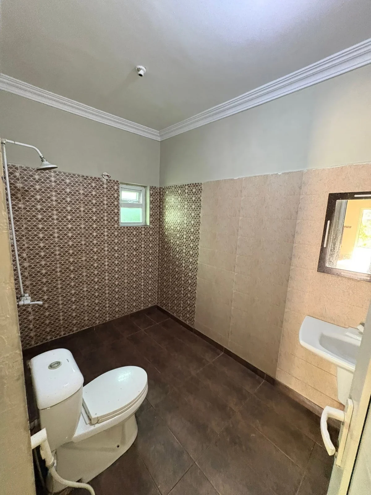 Tiled washroom with shower